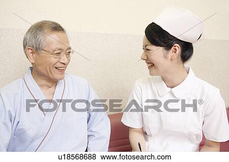 Stock Photo - Nurse and patient. Fotosearch