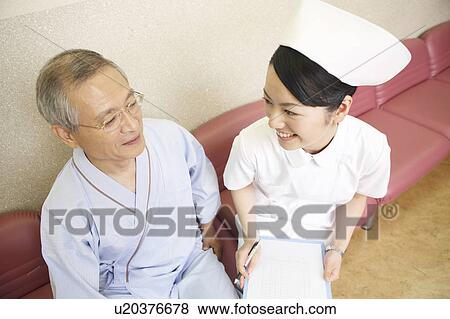 Stock Photo - Nurse and patient. Fotosearch
