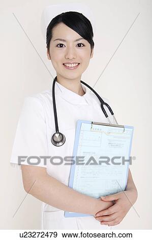 Stock Photo - Portrait of nurse. Fotosearch