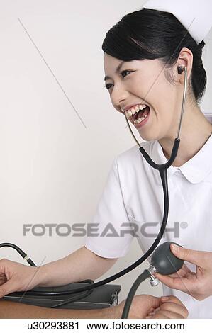 Smiling nurse View Large Photo Image Stock Image - Smiling nurse. Fotosearch