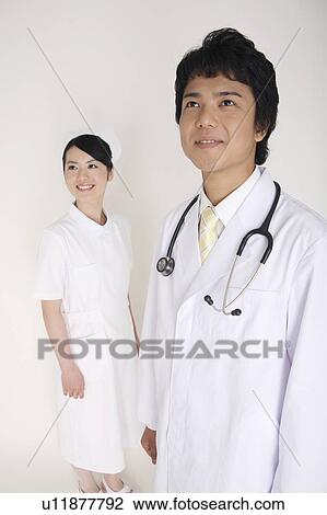 Stock Image - Doctor and nurse. Fotosearch