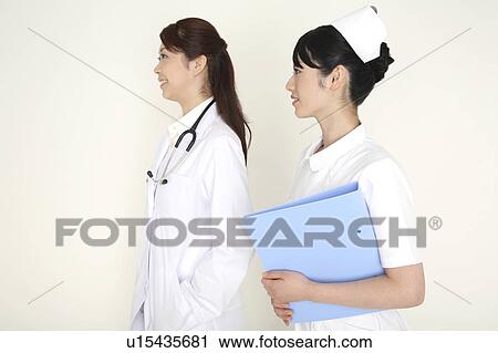 Stock Image - Doctor and nurse. Fotosearch