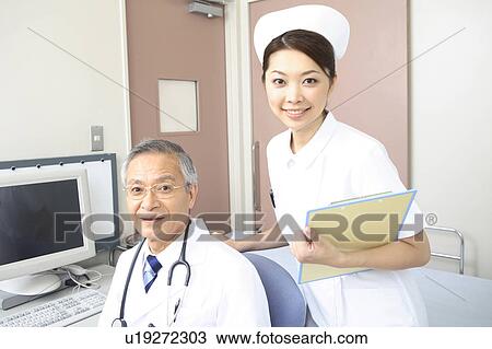Stock Image - Doctor and Nurse. Fotosearch