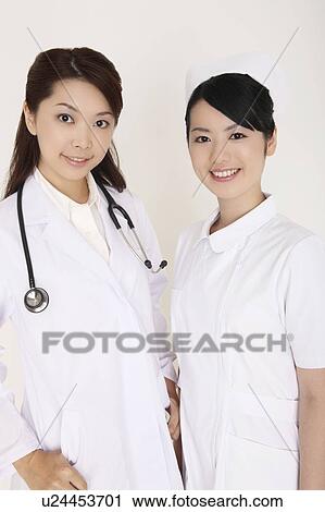 Stock Image - Doctor and nurse. Fotosearch