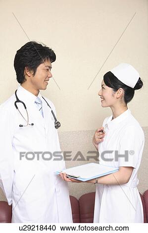 Stock Image - Doctor and nurse. Fotosearch