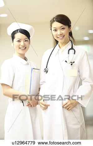 Doctor and nurse View Large Photo Image Stock Photo - Doctor and nurse. Fotosearch