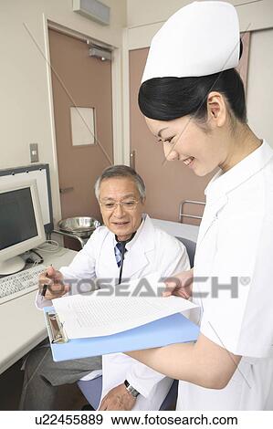 Doctor and nurse View Large Photo Image Stock Photo - Doctor and nurse. Fotosearch