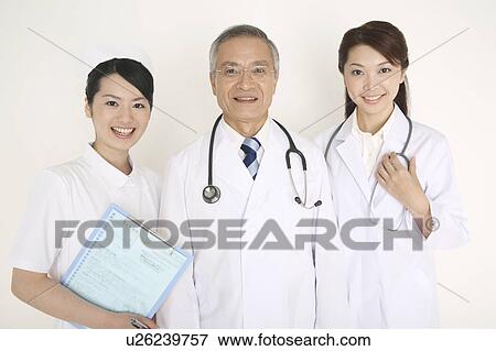 Doctor and nurse View Large Photo Image Stock Photo - Doctor and nurse. Fotosearch