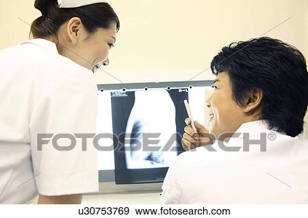 Doctor and nurse View Large Photo Image Stock Photo - Doctor and nurse. Fotosearch
