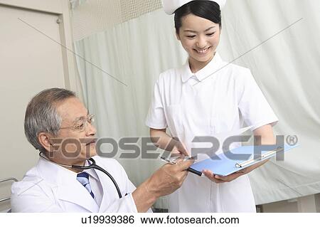 Stock Photograph - Doctor and nurse. Fotosearch