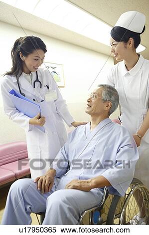 Stock Photography - Doctor and patient talking. Fotosearch
