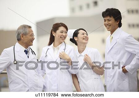 Smiling doctor and nurse View Large Photo Image Picture - Smiling doctor and nurse. Fotosearch