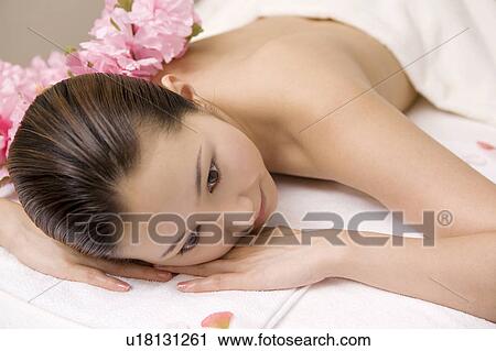 Stock Image - Woman receiving a beauty treatment. Fotosearch