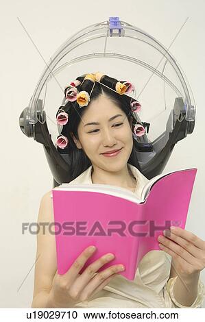 Woman to have a perm View Large Photo Image Stock Image - Woman to have a perm. Fotosearch