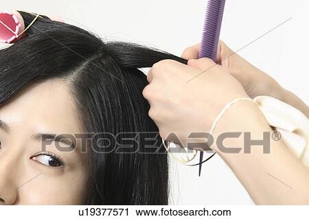 Woman who cuts hair View Large Photo Image Stock Image - Woman who cuts hair. Fotosearch