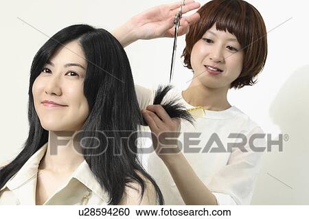 Woman who cuts hair View Large Photo Image Stock Image - Woman who cuts hair. Fotosearch