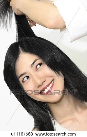 Woman who cuts hair View Large Photo Image Stock Photo - Woman who cuts hair. Fotosearch