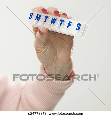 Caucasian senior female hand holding pill box. View Large Photo Image Stock Image - Caucasian senior female hand holding pill box.. Fotosearch