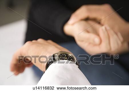 Doctor taking patient's pulse. View Large Photo Image Stock Image - Doctor taking patient's pulse.. Fotosearch
