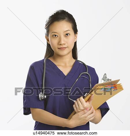 Portrait of Asian Chinese mid-adult female doctor smiling and looking at viewer. View Large Photo Image Stock Photography - Portrait of Asian Chinese mid-adult female doctor smiling and looking at viewer.. Fotosearch