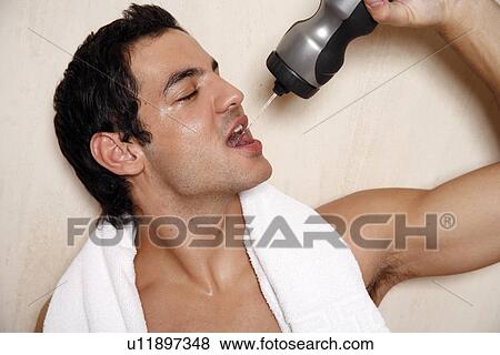 Man cooling off after the gym View Large Photo Image Stock Photo - Man cooling off after the gym. Fotosearch
