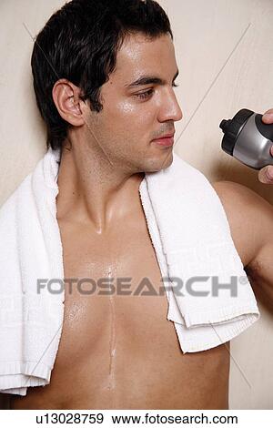 Man cooling off after the gym View Large Photo Image Stock Photo - Man cooling off after the gym. Fotosearch