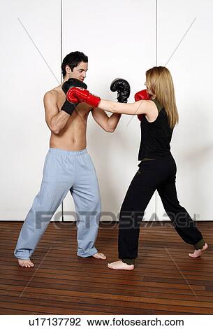 Straight left-hand punch of Active Tae Bo and inside block View Large Photo Image Stock Image - Straight left-hand punch of Active Tae Bo and inside block. Fotosearch
