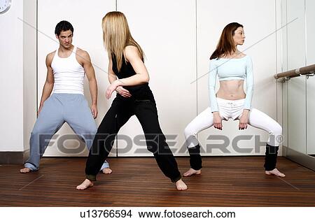 Picture - Students in an Active Tae Bo class, waist down. Fotosearch