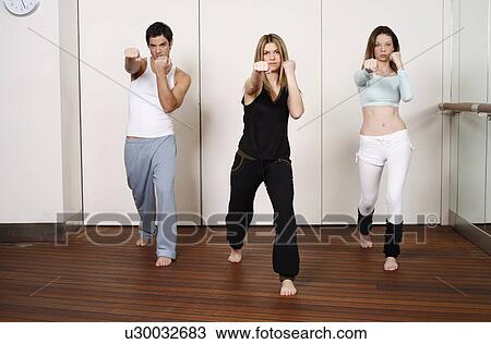 Stock Image - Students in an Active Tae Bo class. Fotosearch