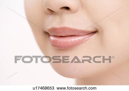 Close up of woman lips, side view  View Large Photo Image Stock Image - Close up of woman lips, side view . Fotosearch