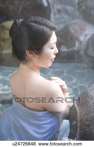 Woman in a hot tub, side view, rear view, high angle view, Japan View Large Photo Image Stock Photo - Woman in a hot tub, side view, rear view, high angle view, Japan. Fotosearch