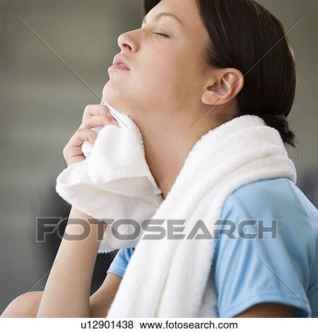 A young women with a towel View Large Photo Image Stock Photo - A young women with a towel. Fotosearch
