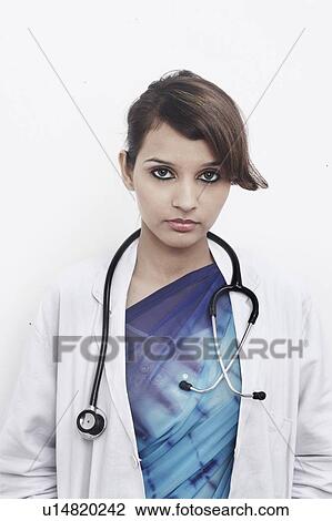 Portrait of a female doctor with a stethoscope around her neck View Large Photo Image Stock Image - Portrait of a female doctor with a stethoscope around her neck. Fotosearch
