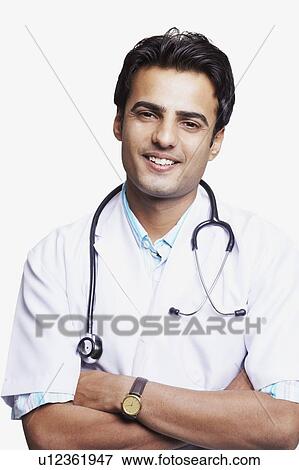 Portrait of a male doctor smiling with a stethoscope around his neck View Large Photo Image Stock Photo - Portrait of a male doctor smiling with a stethoscope around his neck. Fotosearch
