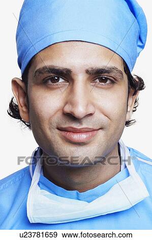 Portrait of a male doctor wearing surgical scrubs View Large Photo Image Stock Photo - Portrait of a male doctor wearing surgical scrubs. Fotosearch