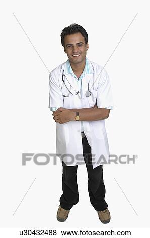 Portrait of a male doctor with a stethoscope around his neck View Large Photo Image Stock Photo - Portrait of a male doctor with a stethoscope around his neck. Fotosearch