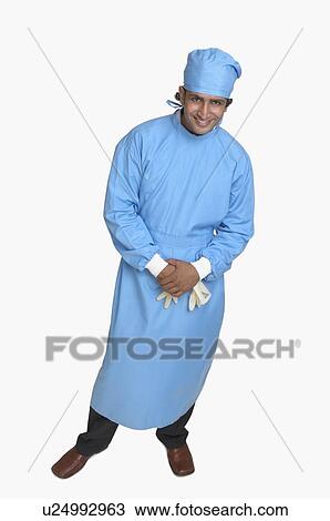 Portrait of a male surgeon smiling View Large Photo Image Stock Image - Portrait of a male surgeon smiling. Fotosearch