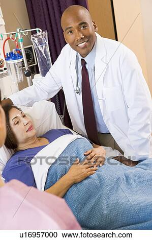 Doctor Talking To Senior Woman View Large Photo Image Stock Image - Doctor Talking To Senior Woman. Fotosearch
