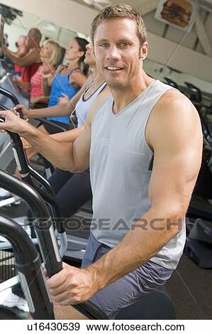 Man Running On Treadmill At Gym View Large Photo Image Stock Photo - Man Running On Treadmill At Gym. Fotosearch