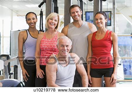 Portrait Of Men And Women At The Gym View Large Photo Image Stock Photo - Portrait Of Men And Women At The Gym. Fotosearch