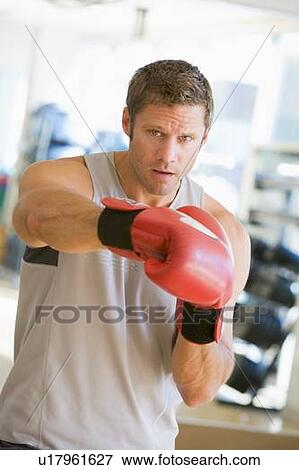 Man Boxing At Gym View Large Photo Image Stock Photo - Man Boxing At Gym. Fotosearch