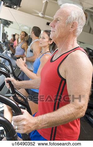 Man Running On Treadmill At Gym View Large Photo Image Stock Image - Man Running On Treadmill At Gym. Fotosearch