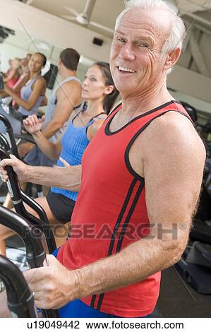 Man Running On Treadmill At Gym View Large Photo Image Stock Image - Man Running On Treadmill At Gym. Fotosearch