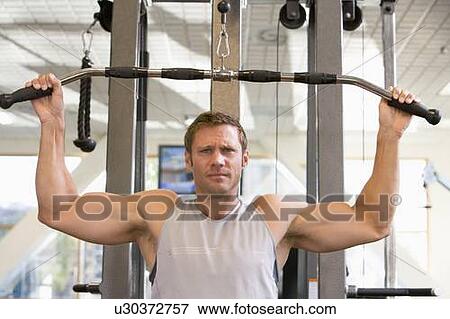 Man Weight Training At Gym View Large Photo Image Stock Photo - Man Weight Training At Gym. Fotosearch