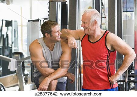 Stock Image - Men At The Gym Together. Fotosearch