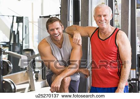 Stock Photo - Men At The Gym Together. Fotosearch