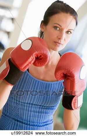 Picture - Woman Boxing At Gym. Fotosearch