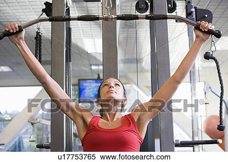 Woman Weight Training At Gym View Large Photo Image Stock Photography - Woman Weight Training At Gym. Fotosearch