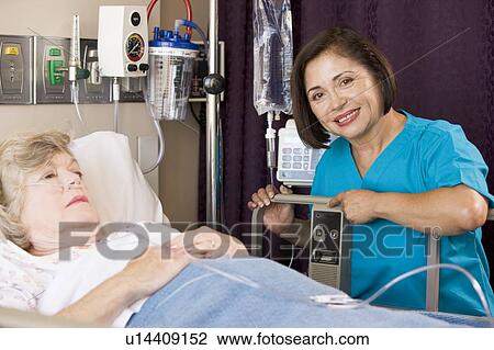 Doctor Checking Up On Senior Woman Patient View Large Photo Image Stock Image - Doctor Checking Up On Senior Woman Patient. Fotosearch
