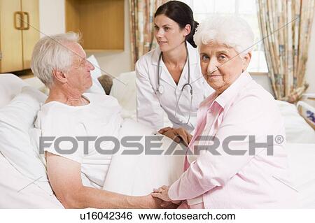 Doctor Talking To Senior Couple View Large Photo Image Stock Photograph - Doctor Talking To Senior Couple. Fotosearch